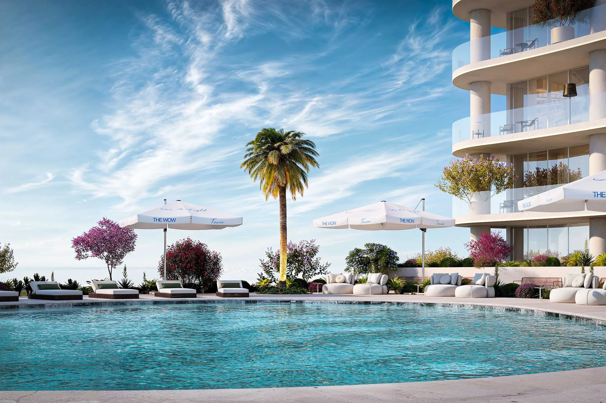 Pool deck with sunbeds, white umbrellas and palm tree under blue sky